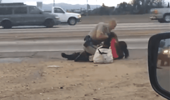 Shocking Footage: Investigation Launched After Police Officer Is Filmed Repeatedly Beating Woman In Head