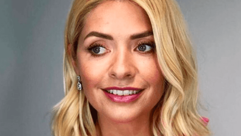 Holly Willoughby’s black dress is from Sandro Paris and we’re insanely in love Holly Willoughby’s black dress is from Sandro Paris and we’re insanely in love
