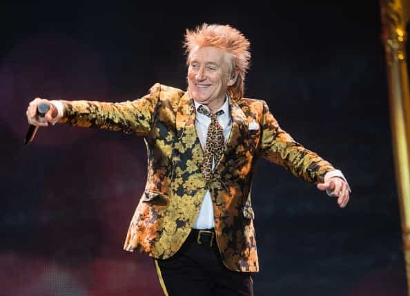 Rod Stewart has been charged for allegedly punching a security guard Rod Stewart has been charged for allegedly punching a security guard