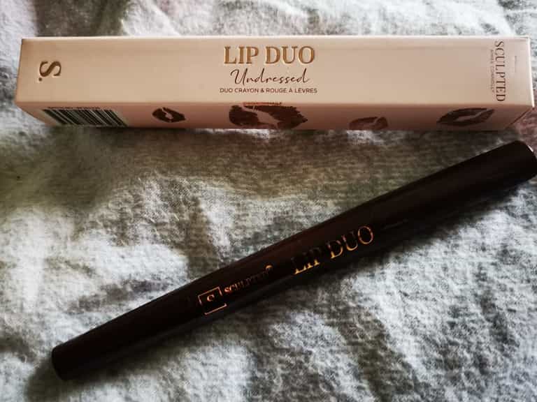 The new Sculpted by Aimee lip duo is a handbag must have The new Sculpted by Aimee lip duo is a handbag must have
