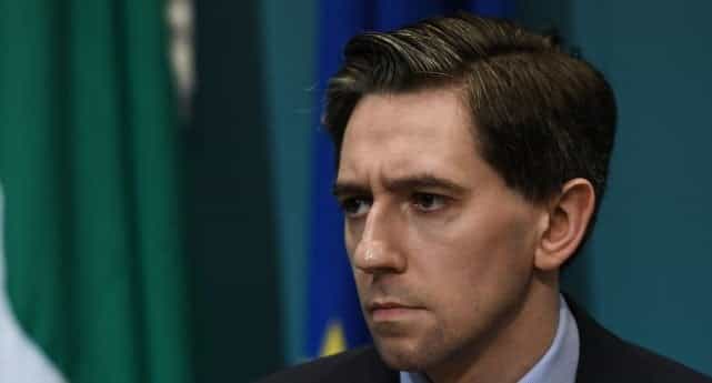 Simon Harris warns Limerick students could be expelled for attending street party Simon Harris warns Limerick students could be expelled for attending street party