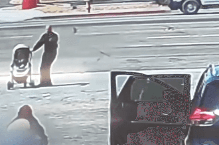 Hero saves baby after pram nearly rolls into oncoming traffic