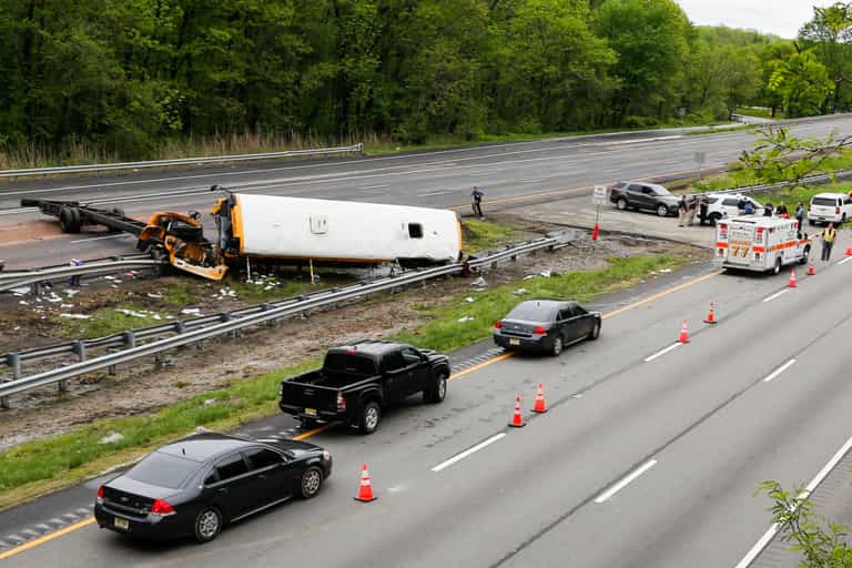 Fifteen people killed in devastating highway collision involving truck and bus