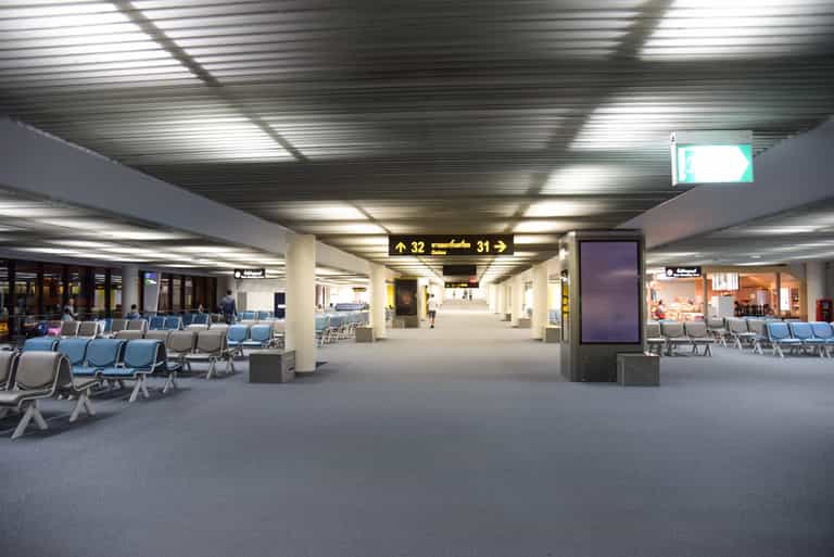 Woman loses leg after getting caught in moving walkway at airport