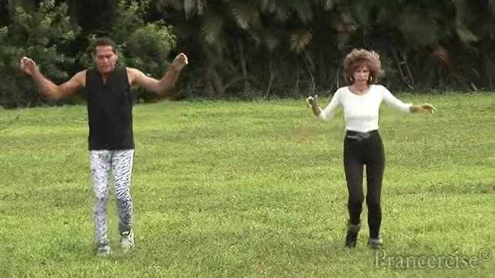 VIDEO – STOP EVERYTHING! The Prancercise Lady Is Back With A New Routine… And Partner