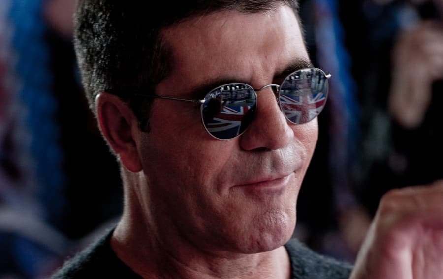 Woman Admits To Smashing Simon Cowell’s Window with a Brick