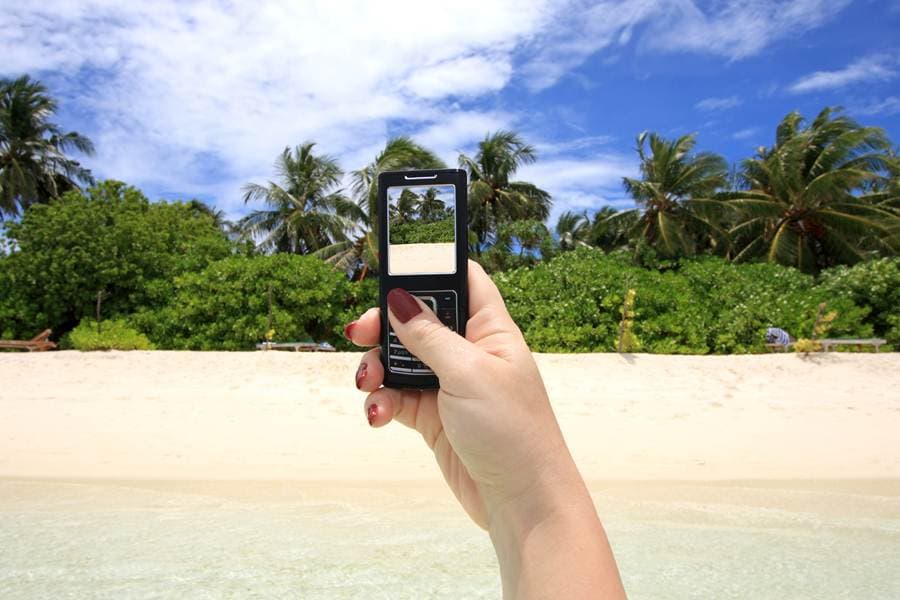 Almost Everyone Checks Social Networking Sites on Holiday