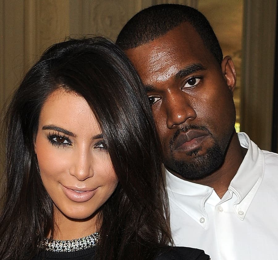 Kim Kardashian Tweets Photos as She Lies Provocatively on The Beach