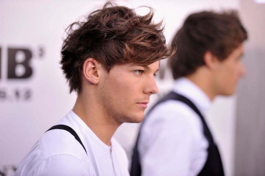 One Direction Fans Damage Louis Tomlinson’s Hearing