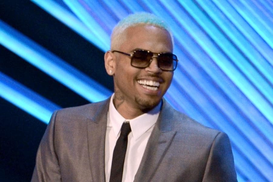 Chris Brown Is in the Doghouse After Kissing Rihanna