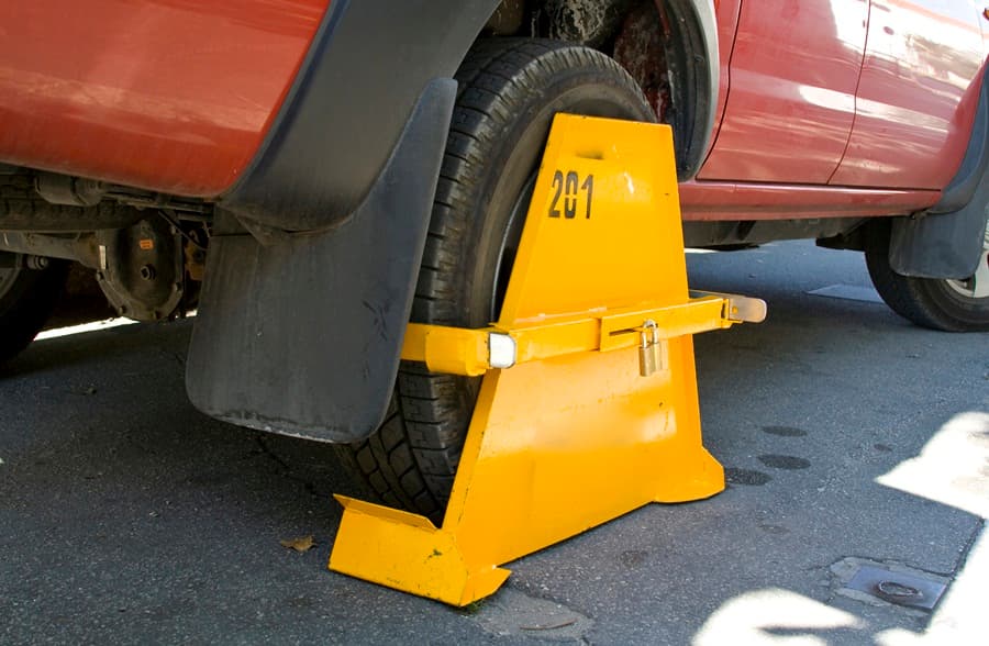 “Clamp? What Clamp?” Irish Man Pulls A Homer Simpson & Drives Off With This Stuck To His Wheel…
