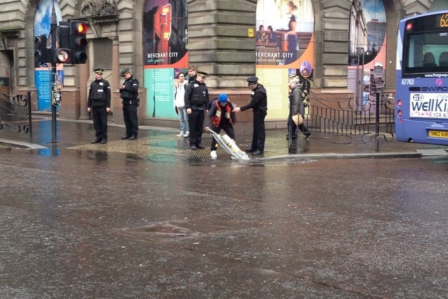 How NOT To Use A Hoover: Picture Of Man Trying To Vacuum A Puddle Goes Viral