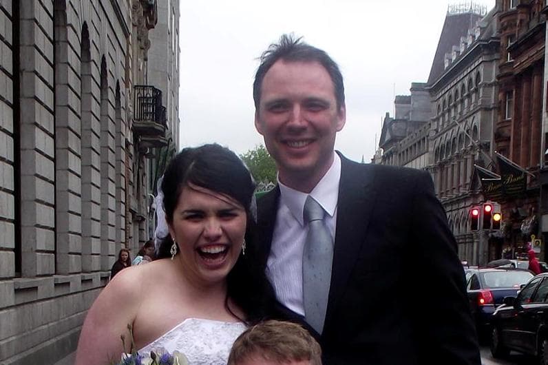 PICTURE – Ever Fancy Getting Your Wedding Photo Taken At A Protest? This Couple Got Theirs Taken At The Central Bank Today