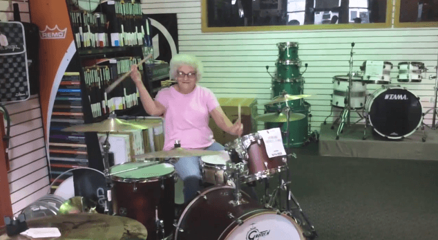 Video: Mystery “Grandma” Rocks Out on the Drums in Wisconsin Music Shop