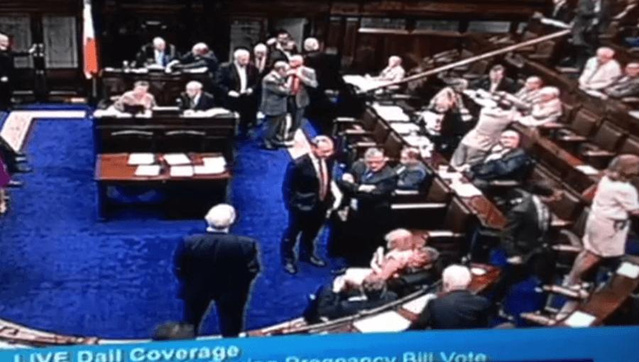 Dáil Footage Shows Male TD Pull Female Colleague Onto Lap During Abortion Debate