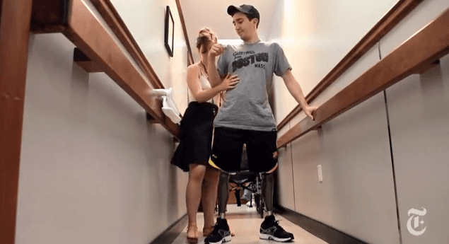 VIDEO – A Marathon Comeback, Boston Survivor Takes First Steps With New Legs