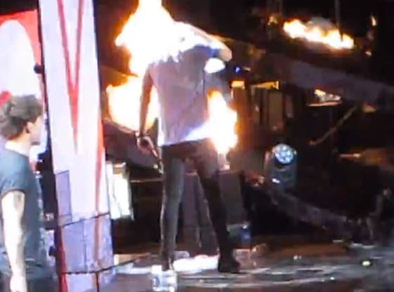 VIDEO – You Light Up My World Like Nobody Else… Harry Styles’ Almost Ends Up In Flames On Stage