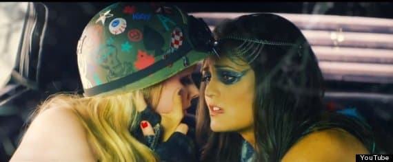 VIDEO: Avril Lavigne Attempts To Save ‘Rock N Roll’ By Kissing A Woman