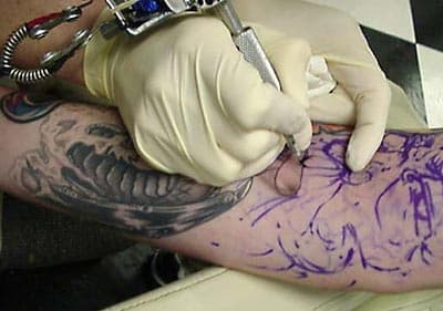 PICTURE: Pain Is Temporary? – Woman Sports A Very Unfortunate Permanent Tattoo