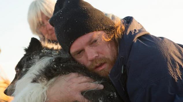 Amazing Pictures Capture The Moment One Man Finds His Dog Alive After US Toronado