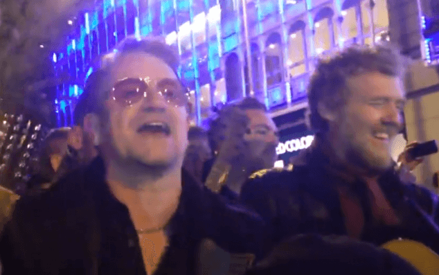 VIDEO: Glen Hansard And Bono Spread Some Christmas Cheer Busking On Grafton Street