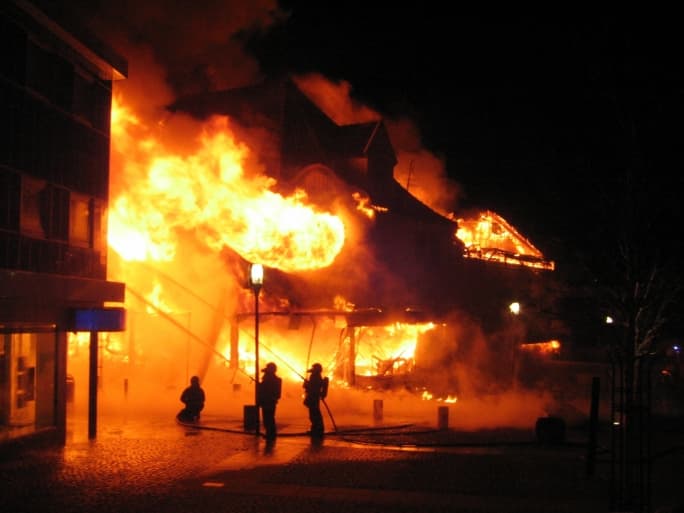 Brave Police Officer Catches Baby Thrown Out Of A Burning Building