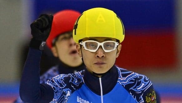 PIC: A Sore Loser? Speed Skating Runner Up Gives Winner Epic Two Finger Salute