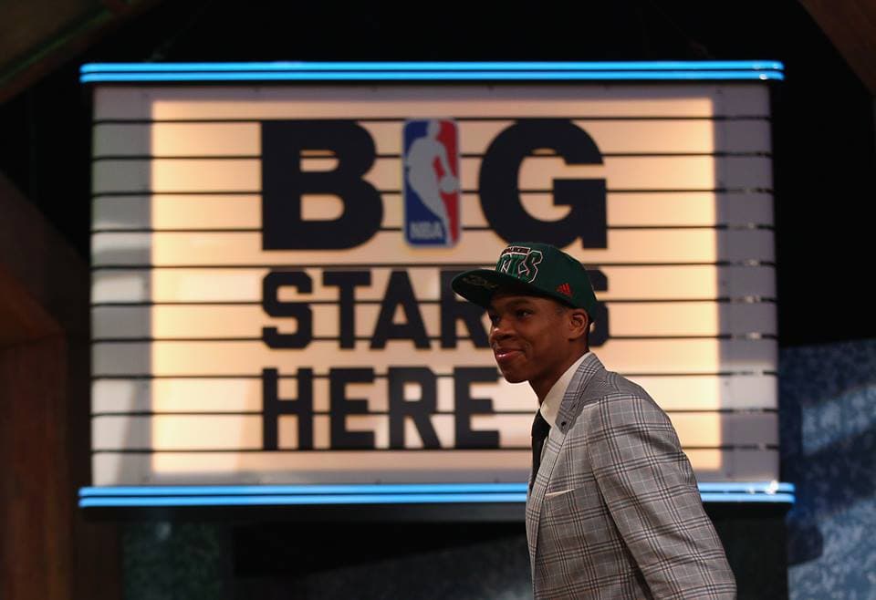 PIC: High Five – Journalist Sizes Up Hands With 19-Year-Old NBA Player