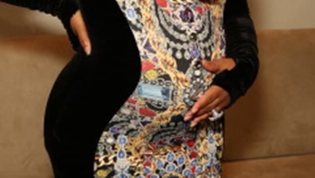 Singer Shows Off Baby Bump at New York Fashion Week