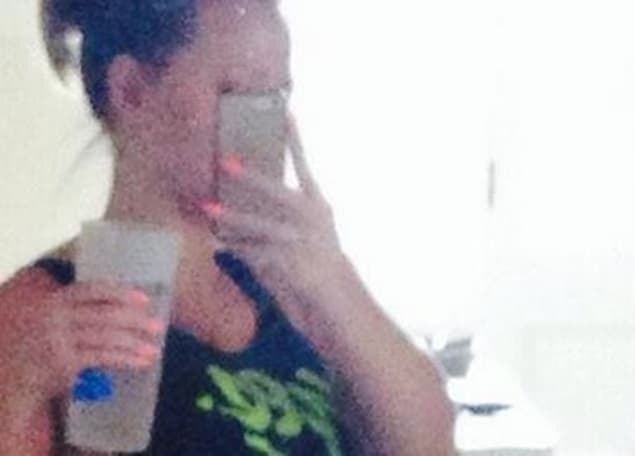 PICTURE: Singer Shares Snap Of Baby Bump On Twitter