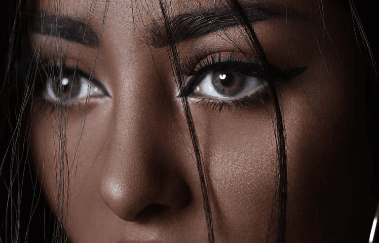 Makeup artist fights back after getting slammed for posing online in blackface