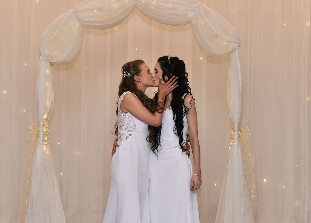 Robyn Peoples & Sharni Edwards make history as first same-sex couple to marry in Northern Ireland