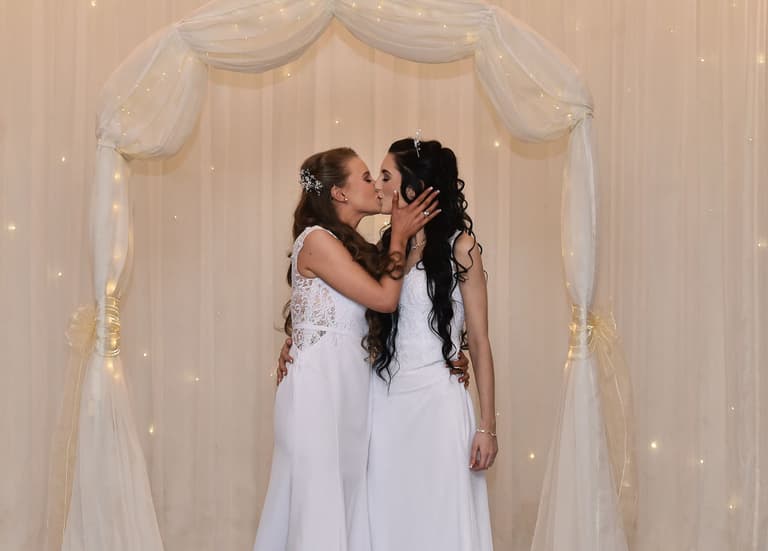 Robyn Peoples & Sharni Edwards make history as first same-sex couple to marry in Northern Ireland Robyn Peoples & Sharni Edwards make history as first same-sex couple to marry in Northern Ireland