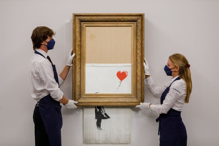 Shredded Banksy work sells for €21.9 million Shredded Banksy work sells for €21.9 million
