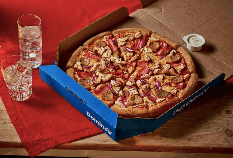 Festive feels: Dominos has launched their first-ever Christmas-themed pizza Festive feels: Dominos has launched their first-ever Christmas-themed pizza