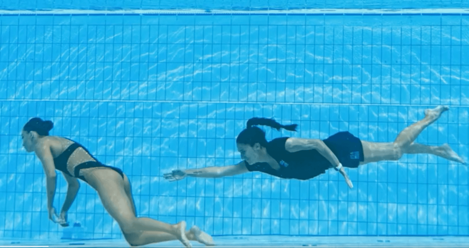 WATCH: Incredible moment coach saves swimmer as she faints underwater