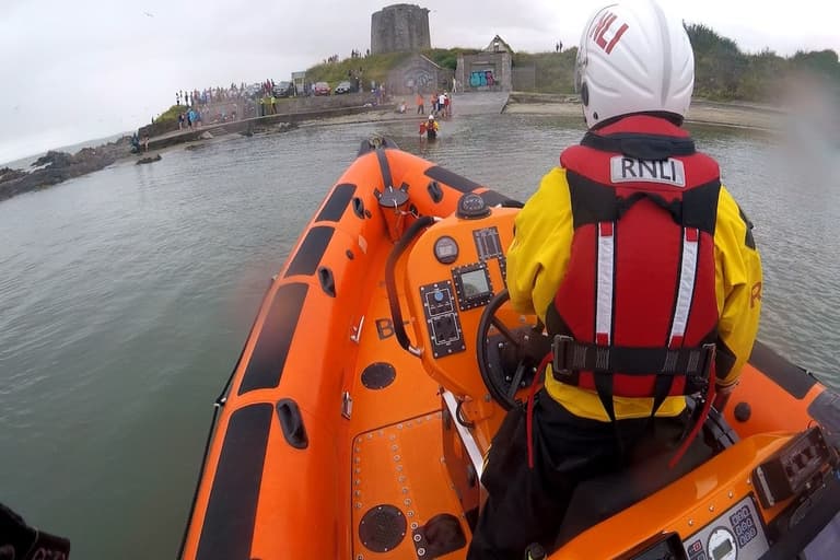 Young girl shaken after paddle-board is blown out to sea