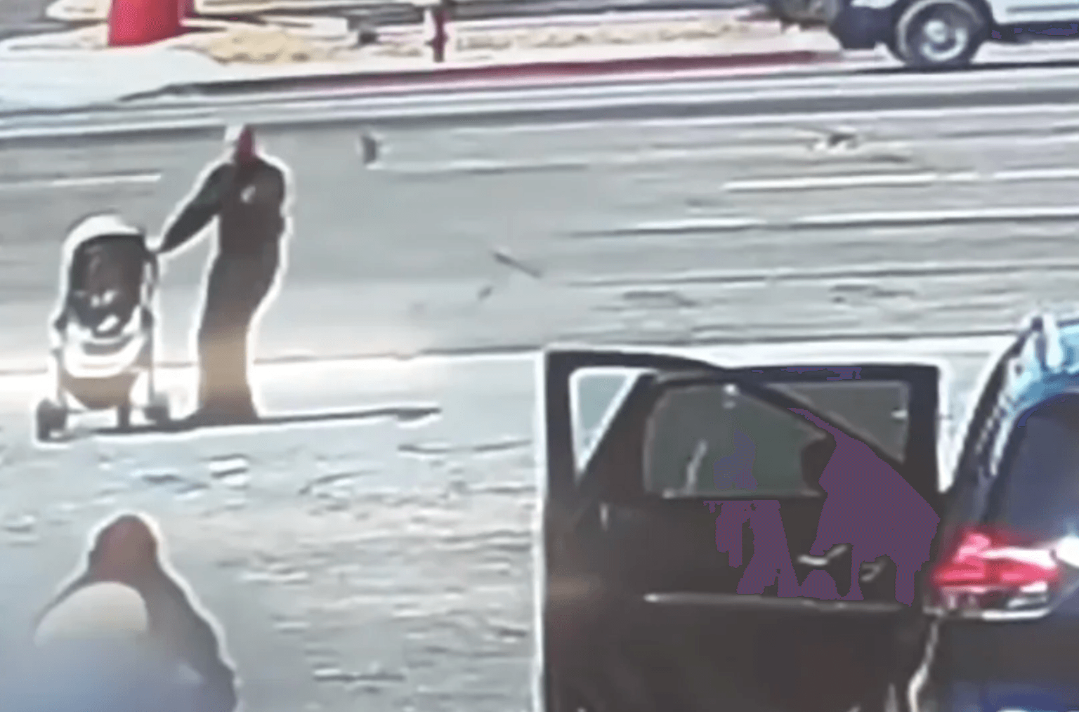Hero saves baby after pram nearly rolls into oncoming traffic