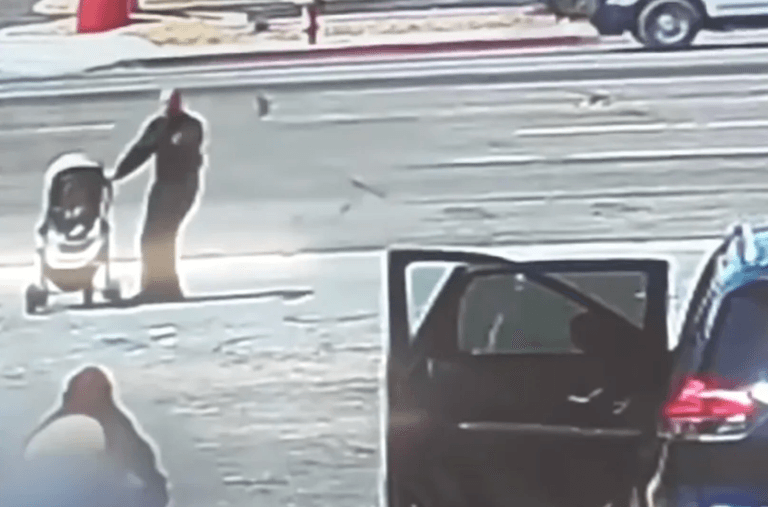 Hero saves baby after pram nearly rolls into oncoming traffic