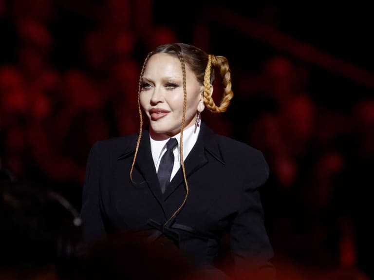 Madonna updates fans on upcoming world tour after hospital dash