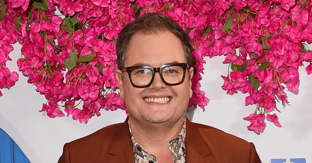 Alan Carr moves on with new man two years after divorce