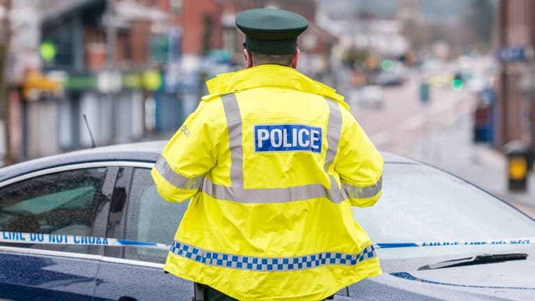 Pedestrian dies after being hit by lorry at busy junction