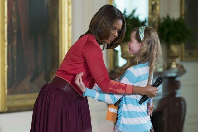 Watch: 10 Year Old Girl Gives Michelle Obama Her Unemployed Dad’s Resumé