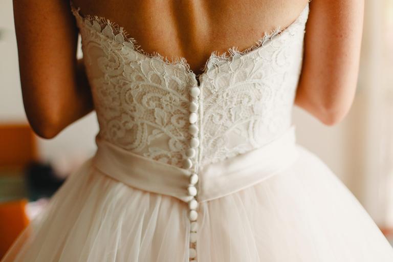 Bride disinvites woman from wedding, still wants to wear her dress
