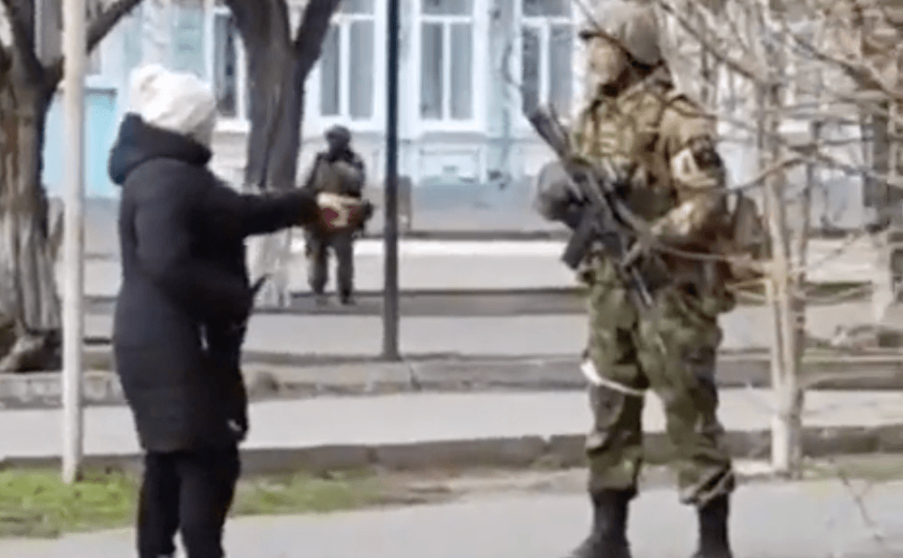 WATCH: Ukrainian woman bravely confronts Russian soldier