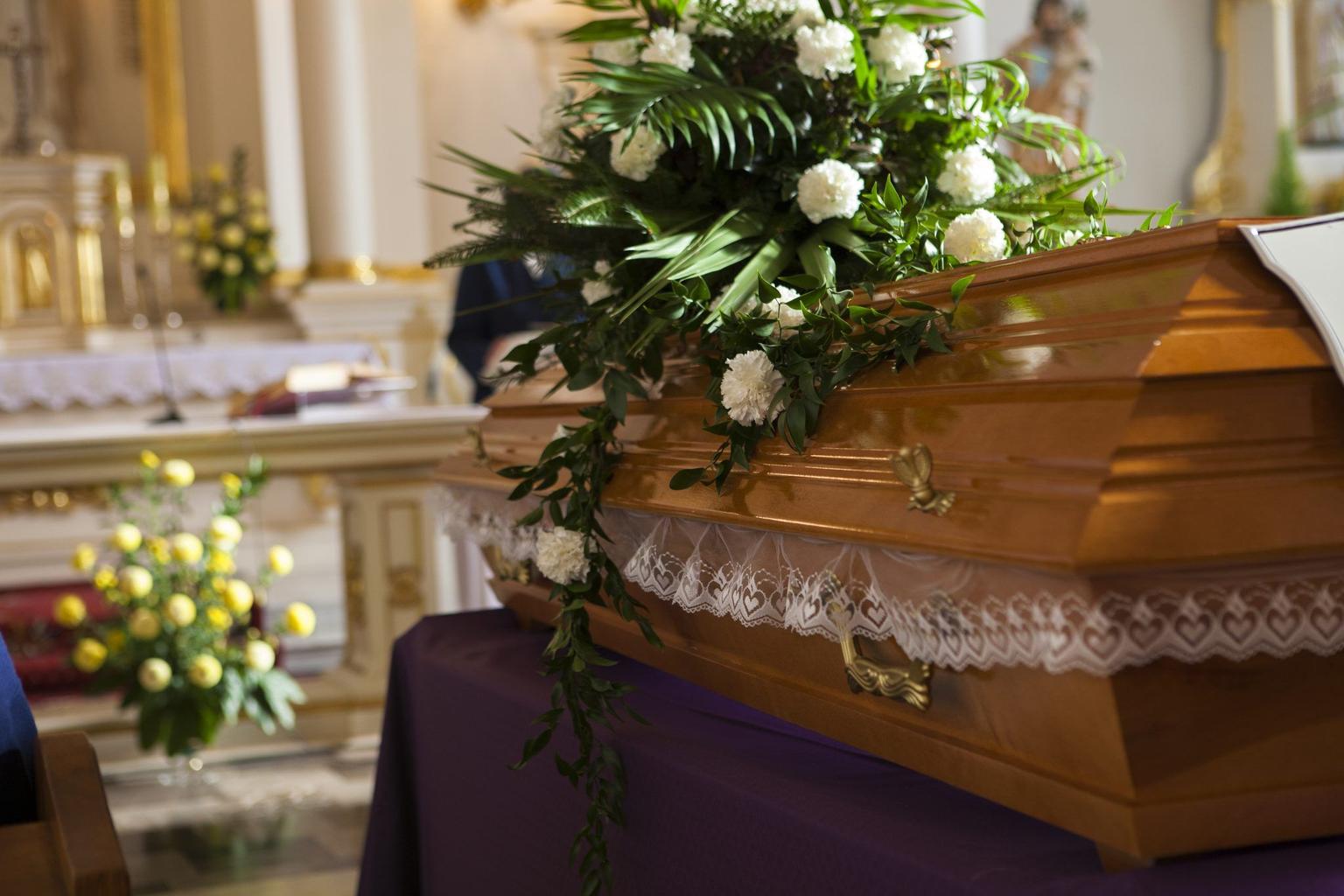Presumed-dead woman bangs on own coffin during funeral