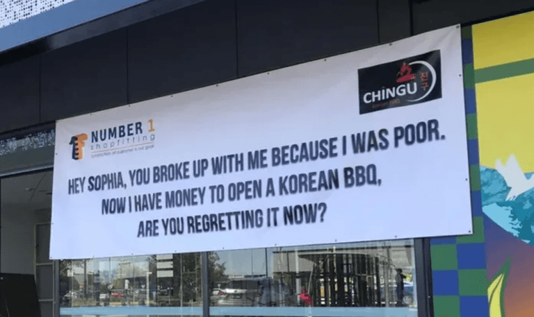 Restaurant owner goes viral for giant breakup revenge sign