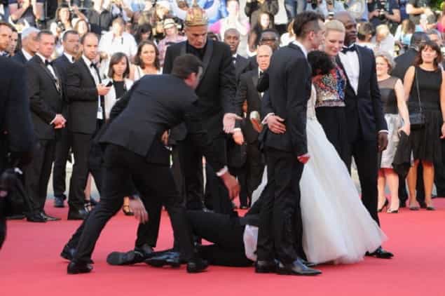 Man Crawls Up Skirt Of Actress After Crashing Red Carpet At Cannes Man Crawls Up Skirt Of Actress After Crashing Red Carpet At Cannes