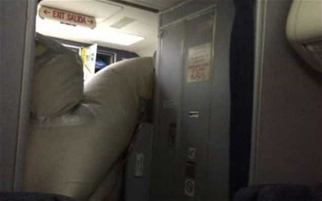 Fear Of Flying? Maybe You Should Look Away Now…Emergency Slide Inflates Mid-Flight Fear Of Flying? Maybe You Should Look Away Now…Emergency Slide Inflates Mid-Flight