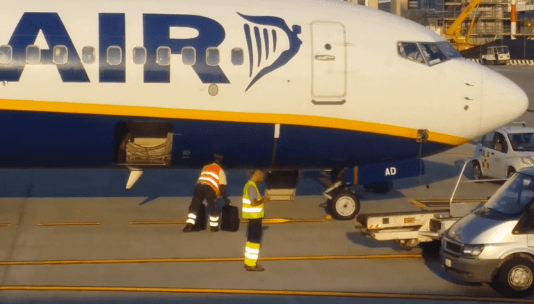 VIDEO: Baggage Handlers Filmed Throwing Luggage On and Off a Ryanair Flight VIDEO: Baggage Handlers Filmed Throwing Luggage On and Off a Ryanair Flight